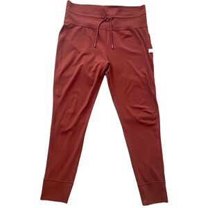 Vuori Daily Leggings size XL (14-16) in Brick Red